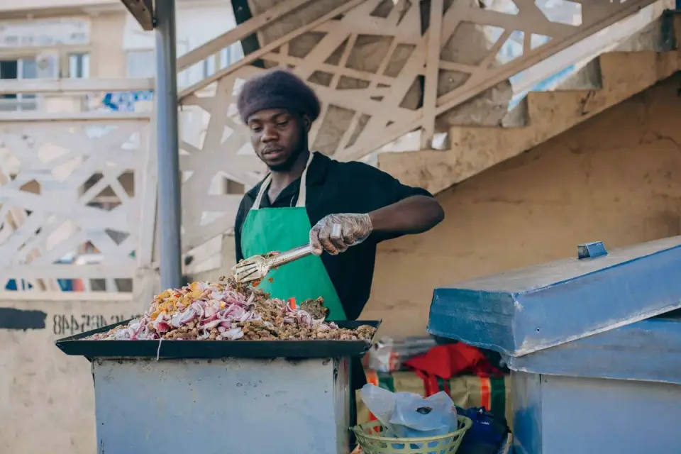 Dog owner preparing a meal