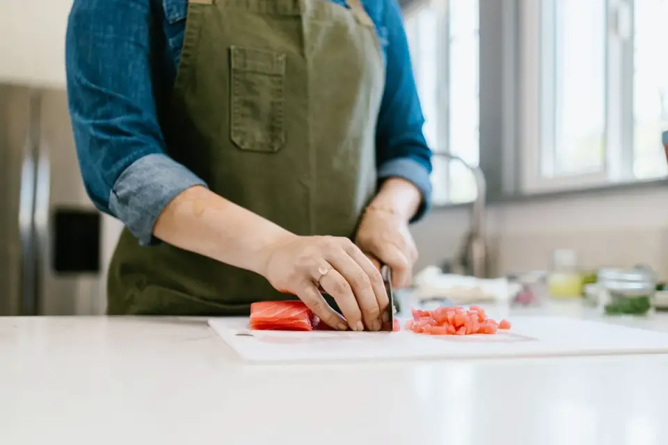 Dog owner preparing a meal