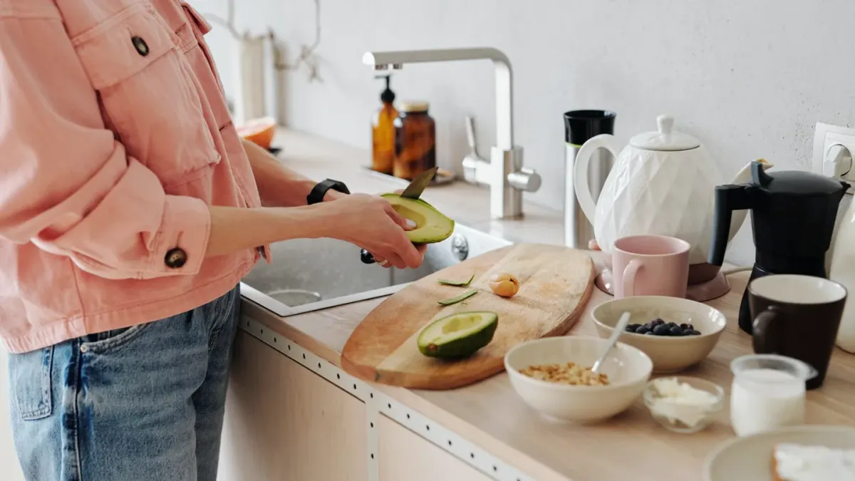 Dog owner preparing a meal