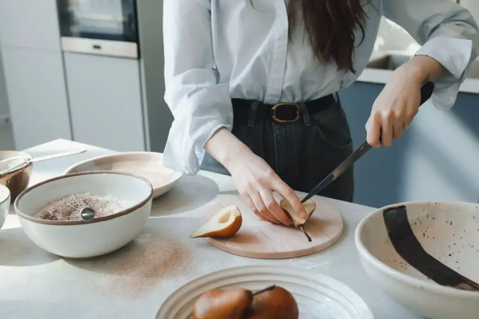 Dog owner preparing a meal