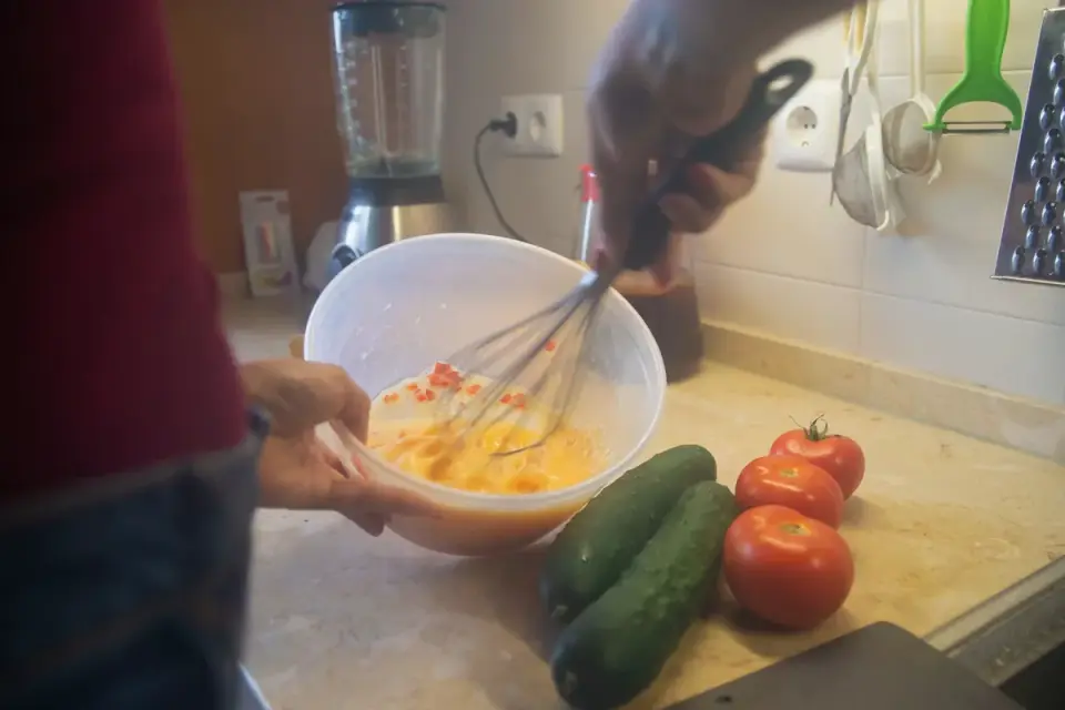 Dog owner preparing a meal