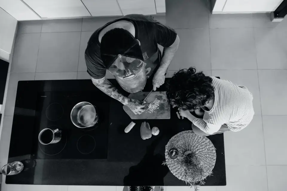 Dog owner preparing a meal