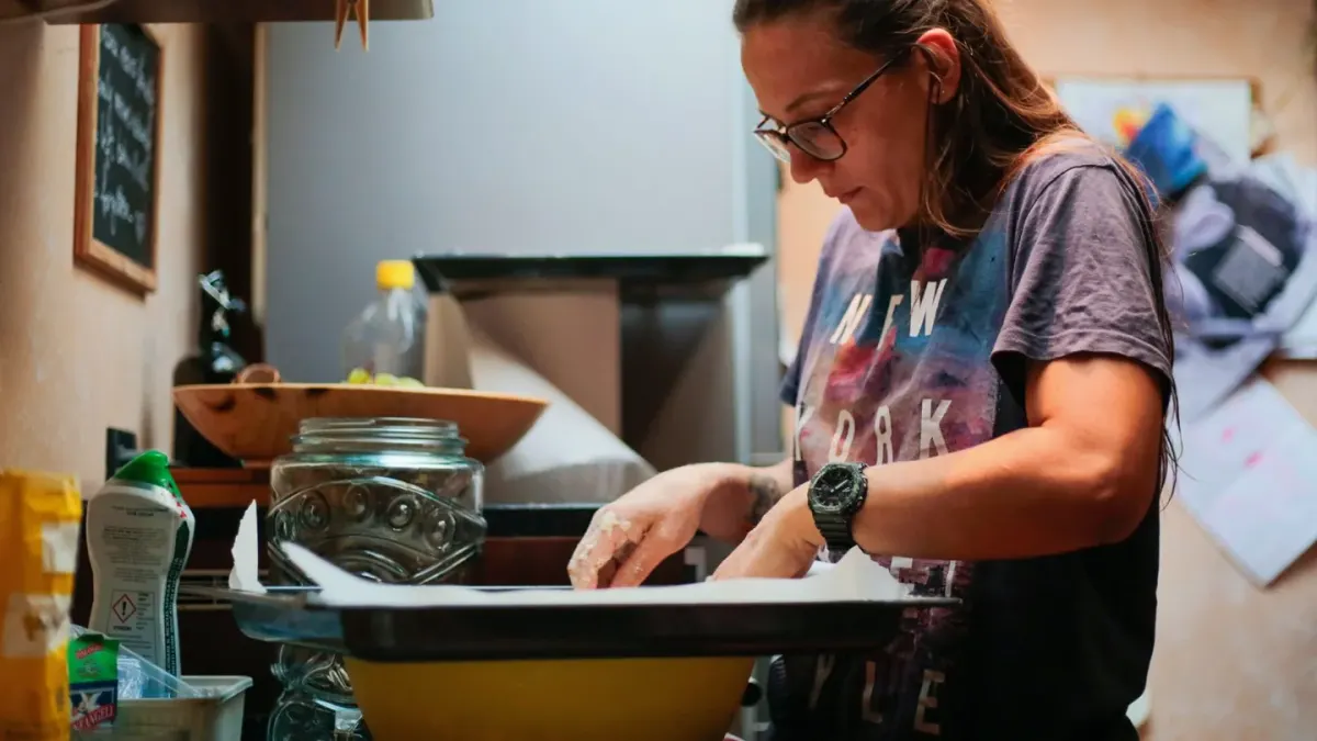 Dog owner preparing a meal