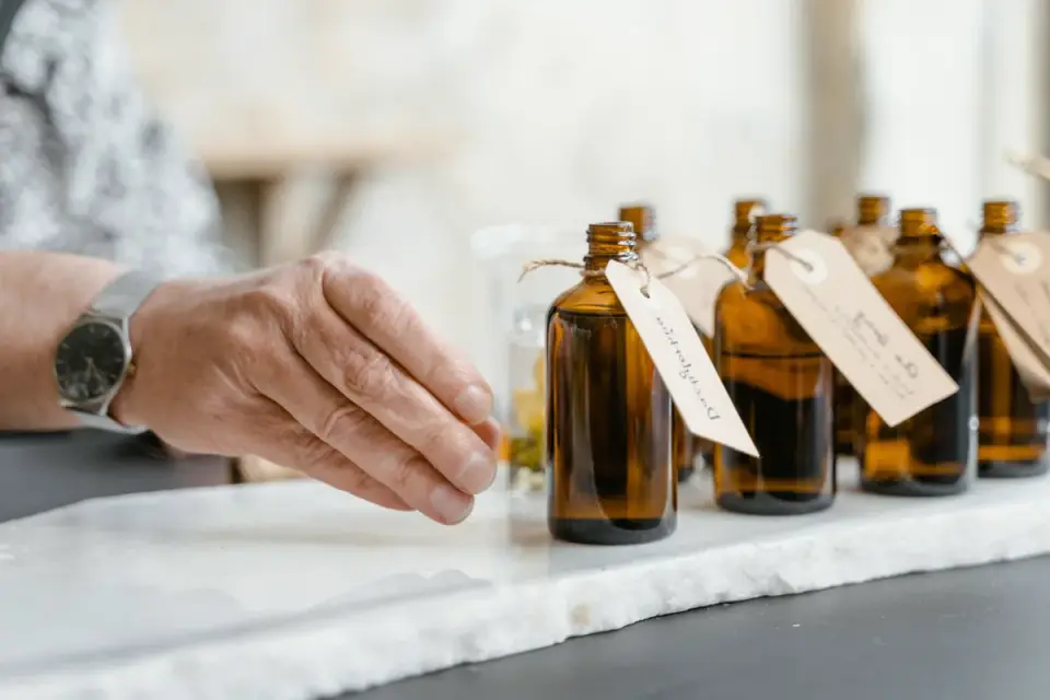 Hands comparing information panels on two pet supplement containers
