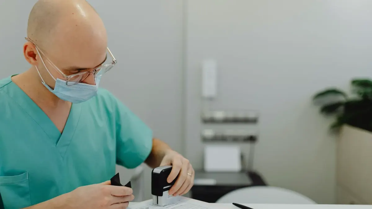Veterinarian reviewing travel paperwork with a dog on the exam table